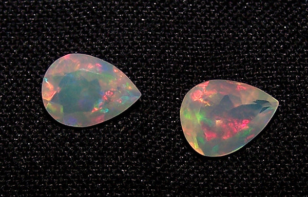 1.70 cts Insane Metallic Rainbow Fire Color Play Ethiopian Welo Opal Faceted 7 x 9 MM Pears : Loose Gemstone > AAA : Matched pair for Earrings