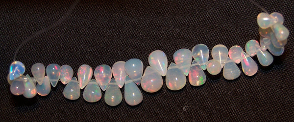 23.90 cts Insane Rainbow Fire Transparent Ethiopian Welo Opal Tear Drop (37 Pcs) Beads Layout 4.2 to 8.9 MM