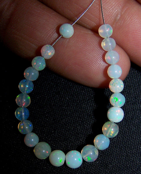 Ultra Rare 10 Cts Insane Multi Rainbow Fire Ethiopian Welo Opal Round Sphere Balls, 22 Pieces, Mini-String 4.3 - 5.4 MM