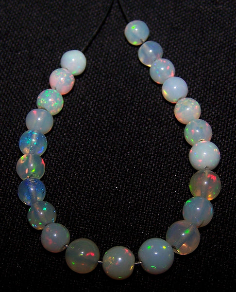Ultra Rare 10 Cts Insane Multi Rainbow Fire Ethiopian Welo Opal Round Sphere Balls, 22 Pieces, Mini-String 4.3 - 5.4 MM