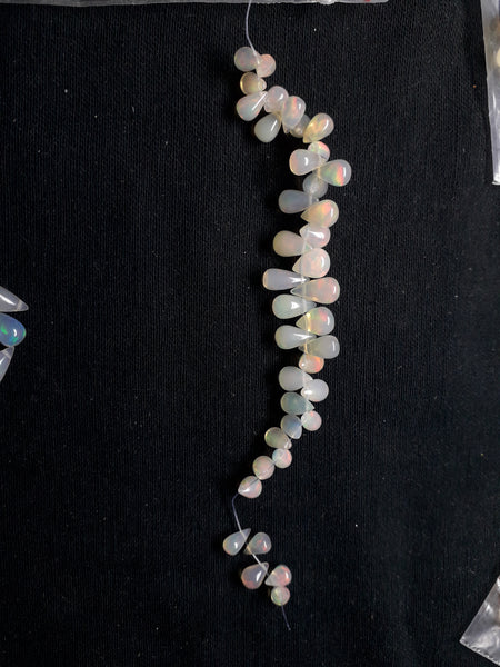 Custom Assortment : Multi Rainbow Fire Milky Ethiopian Welo Opal Tear Drops (53 Pcs) Beads Layout 9 x 5 to 11.5 x 6 MM