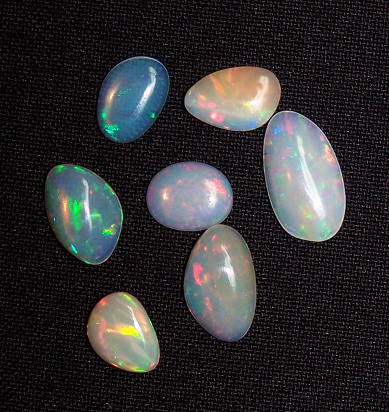 Large 9.40 cts Insane Rainbow Color Play Ethiopian Welo Opal Smooth Slice Gems AAA, Milky and Transparent, (7 Pcs) Wholesale Lot/Parcel