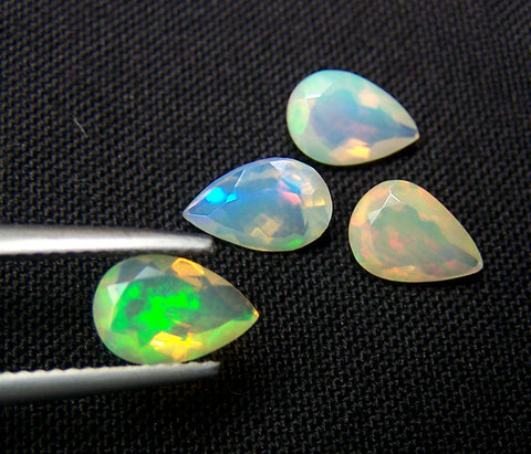 3.10 cts Insane Metallic Rainbow Fire Color Play Ethiopian Welo Opal Faceted 6 x 9 MM Pears : 4 Pcs Loose Gemstone Lot/Parcel > AAA