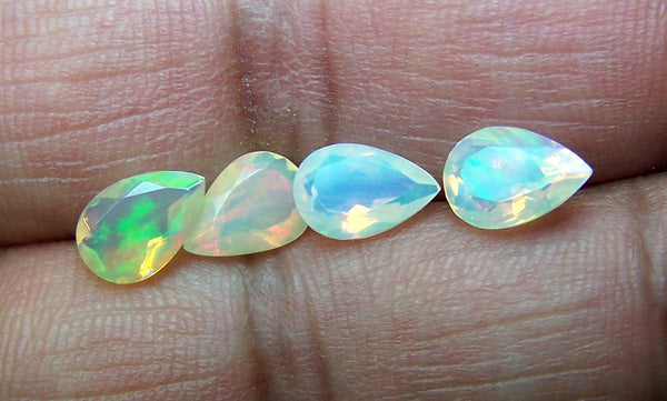 3.10 cts Insane Metallic Rainbow Fire Color Play Ethiopian Welo Opal Faceted 6 x 9 MM Pears : 4 Pcs Loose Gemstone Lot/Parcel > AAA