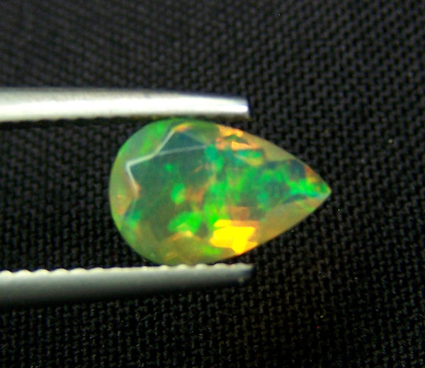 0.90 cts Insane Metallic Rainbow Fire Color Play Ethiopian Welo Opal Faceted Pear Loose Gemstone > AAA