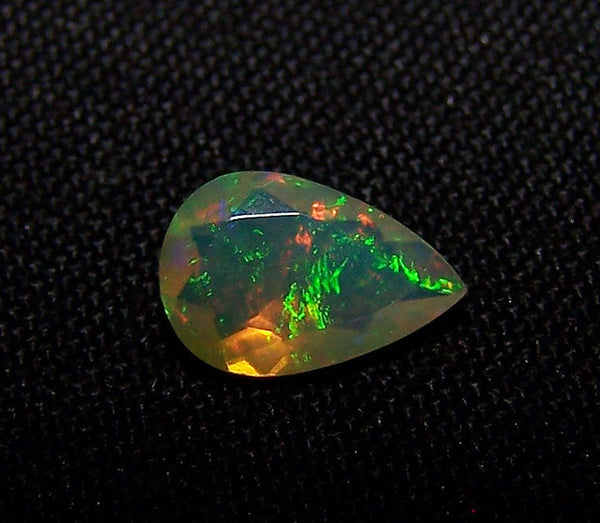 0.90 cts Insane Metallic Rainbow Fire Color Play Ethiopian Welo Opal Faceted Pear Loose Gemstone > AAA