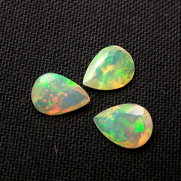 1.70 cts Insane Metallic Rainbow Fire Color Play Ethiopian Welo Opal Faceted 6 x 8 MM Pears : 3 Pcs Loose Gemstone Lot/Parcel > AAA