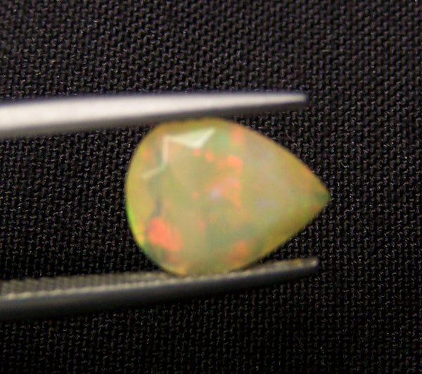 1.60 cts Insane Metallic Rainbow Fire Color Play Ethiopian Welo Opal Faceted Pear Loose Gemstone > AAA