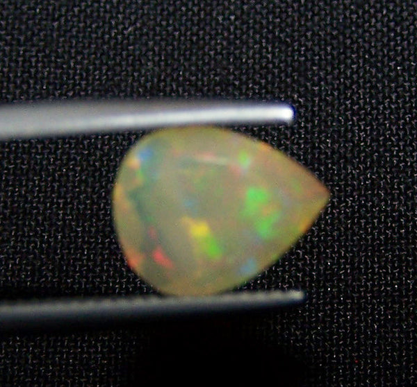 1.60 cts Insane Metallic Rainbow Fire Color Play Ethiopian Welo Opal Faceted Pear Loose Gemstone > AAA