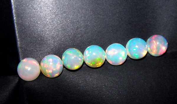 Masterpiece Collection : 8 MM Calibrated Insane Metallic Rainbow Fire Color Play Ethiopian Welo Opal High Dome Cabochons 7 Pieces Loose Gemstone Lot/Parcel > AAA