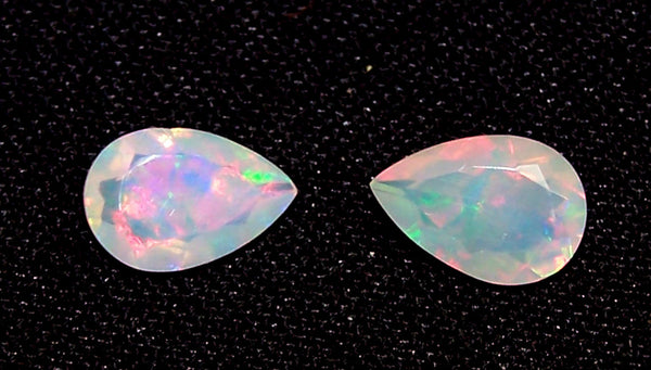 2.25 cts Insane Metallic Rainbow Fire Color Play Ethiopian Welo Opal Faceted 7 x 10 MM Pears : Loose Gemstone > AAA : Matched pair for Earrings