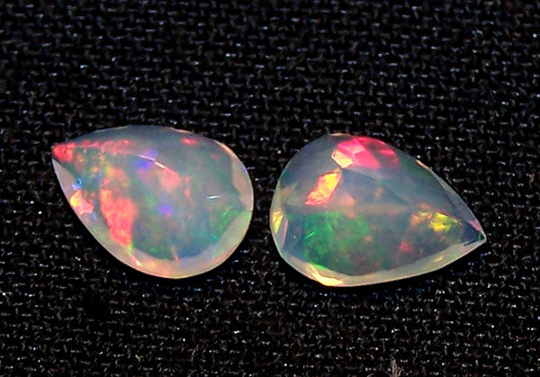 1.70 cts Insane Metallic Rainbow Fire Color Play Ethiopian Welo Opal Faceted 7 x 9 MM Pears : Loose Gemstone > AAA : Matched pair for Earrings