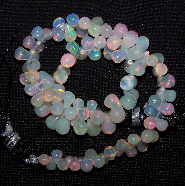 35.80 cts Insane Rainbow Fire Transparent Ethiopian Welo Opal Tear Drop (104 Pcs) Beads Layout 3.5 to 6.5 MM