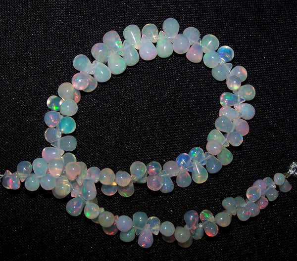 35.80 cts Insane Rainbow Fire Transparent Ethiopian Welo Opal Tear Drop (104 Pcs) Beads Layout 3.5 to 6.5 MM