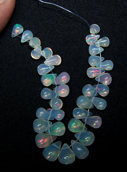 20.50 cts Multi Rainbow Fire Transparent Ethiopian Welo Opal Tear Drop (36 Pcs) Beads Layout 3.7 to 7.8 MM > For Necklace