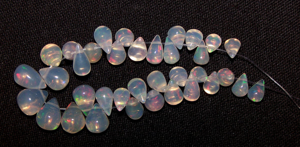 20.50 cts Multi Rainbow Fire Transparent Ethiopian Welo Opal Tear Drop (36 Pcs) Beads Layout 3.7 to 7.8 MM > For Necklace