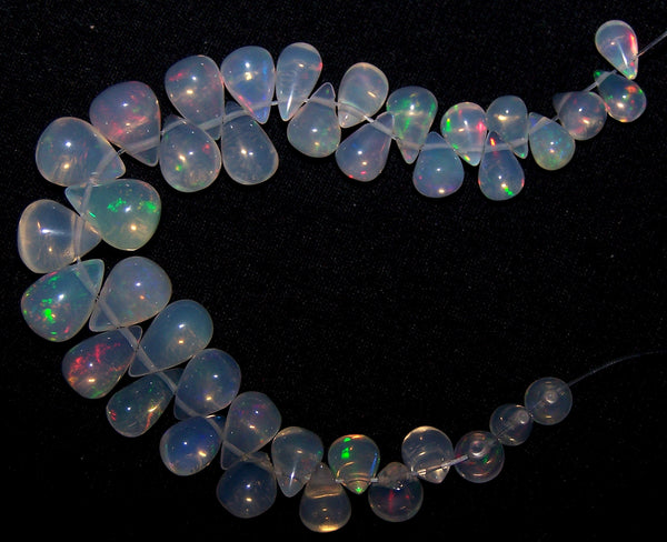 23.30 cts Multi Rainbow Fire Transparent Ethiopian Welo Opal Tear Drops (38 Pcs) Beads Layout 4x5.5 to 6.5 x 8.5 MM AAA