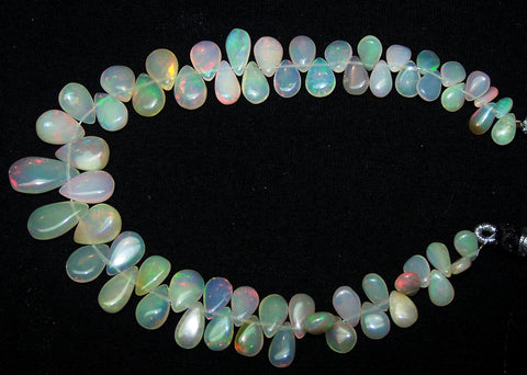 48.50 cts Insane Fire Multi Rainbow Color Play Milky Ethiopian Welo Opal Plain Almond-Pear Briolette (61 pieces) Beads Layout 4.5 x 6 to 8 x 14 MM AAA