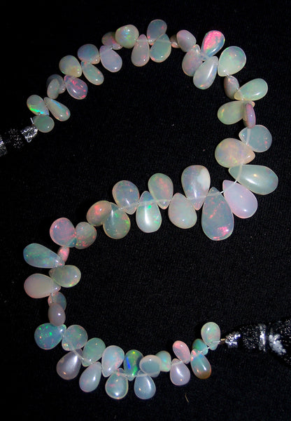 48.50 cts Insane Fire Multi Rainbow Color Play Milky Ethiopian Welo Opal Plain Almond-Pear Briolette (61 pieces) Beads Layout 4.5 x 6 to 8 x 14 MM AAA