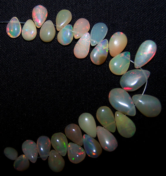 22.90 cts Insance Fire Multi Rainbow Play Caramel Color Milky Ethiopian Welo Opal Plain Briolette (29 pieces) Beads, (Almond-Pear) Mini - Layout 5 x 8 to 7 x 11.5 MM