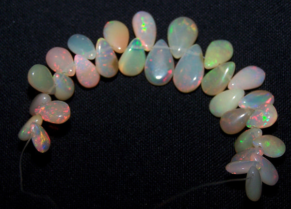 22.90 cts Insance Fire Multi Rainbow Play Caramel Color Milky Ethiopian Welo Opal Plain Briolette (29 pieces) Beads, (Almond-Pear) Mini - Layout 5 x 8 to 7 x 11.5 MM