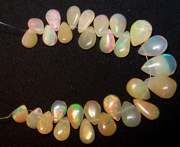24.80 cts Insance Fire Multi Rainbow Color Play Caramel Color Milky Ethiopian Welo Opal Plain Briolette (29 pieces) Beads, (Almond-Pear) Mini - Layout 5.5 to 12.5 MM