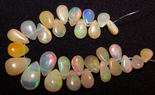 24.80 cts Insance Fire Multi Rainbow Color Play Caramel Color Milky Ethiopian Welo Opal Plain Briolette (29 pieces) Beads, (Almond-Pear) Mini - Layout 5.5 to 12.5 MM