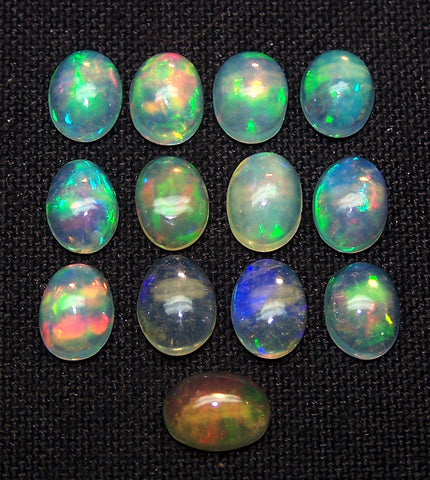 5 x 7 MM Ethiopian Welo Opal Oval Cabochon, Insane Rainbow Fire Metallic Color Play AAA, Milky & Transparent, (13 Pc) Wholesale Lot/Parcel