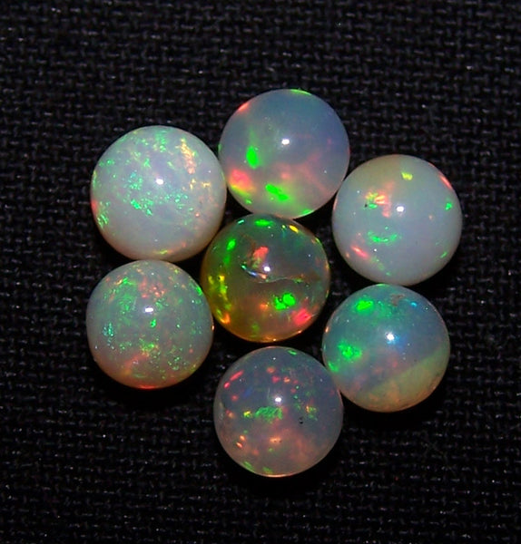 Ultra Rare 5.20 Cts Insane Multi Rainbow Fire Ethiopian Welo Opal Round Sphere Balls, (7 Pcs), 5.2 - 5.7 MM