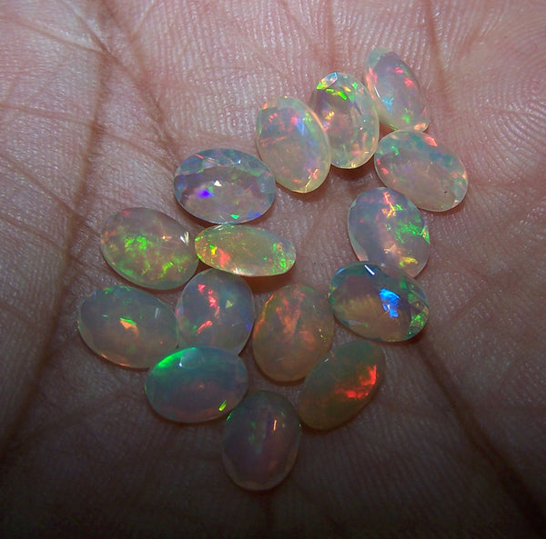 7 x 9 MM Faceted Ethiopian Welo Opal Ovals, Insane Rainbow Fire Metallic Color Play AAA, Milky & Transparent, Wholesale Lot/Parcel