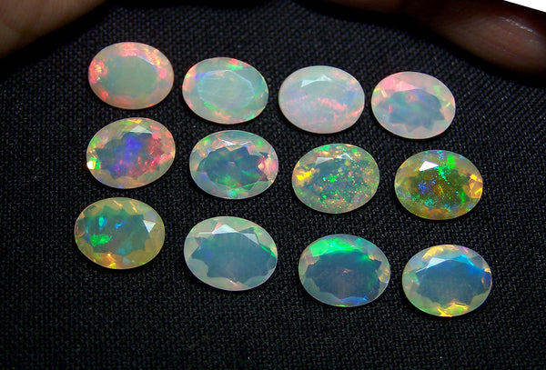 7 x 9 MM Faceted Ethiopian Welo Opal Ovals, Insane Rainbow Fire Metallic Color Play AAA, Milky & Transparent, (12 Pc) Wholesale Lot/Parcel