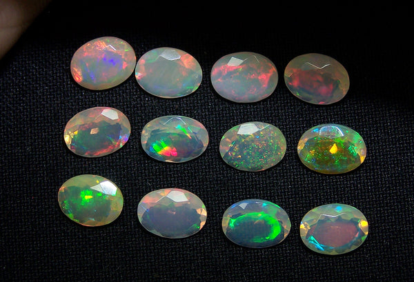 7 x 9 MM Faceted Ethiopian Welo Opal Ovals, Insane Rainbow Fire Metallic Color Play AAA, Milky & Transparent, (12 Pc) Wholesale Lot/Parcel